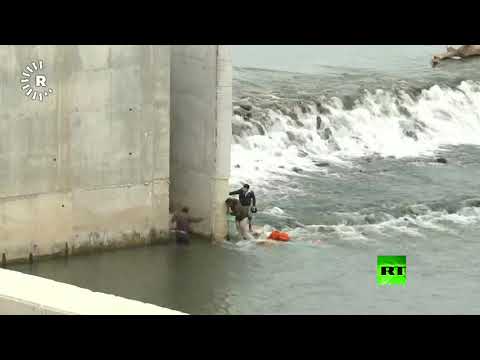 شاهد لاجئون يحاولون عبور نهر ايفروس للوصول إلى أوروبا